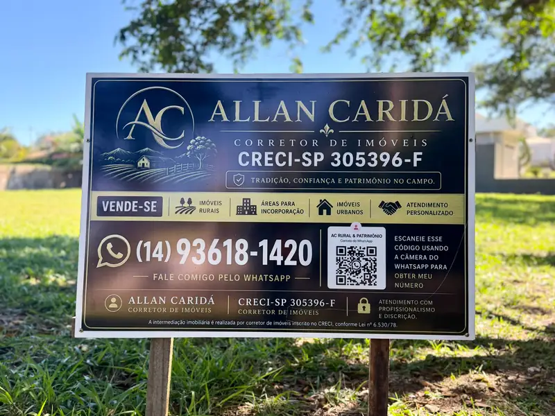 Placa do Allan Caridá no terreno à venda no Parque Laguna